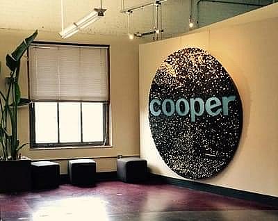 Cooper logo on the wall of the office