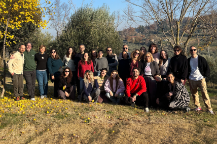 The Tangible team gathered outdoors during a team building moment.