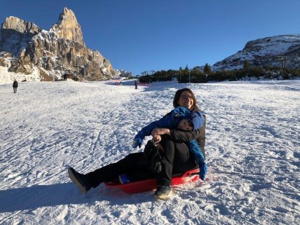 Annalaura in the mountains with his son